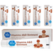 Multiple boxes and tubes of Vitamins A&D Ointment on a white background
